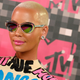 Illustration for article titled Amber Rose Is Pissed at iGQ /ifor Negative Profile That References Kanye, Wiz Khalifa